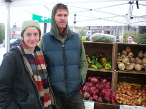 Susan and Greg manning Red Fire Farm's tent at the Dewey Square farmers market