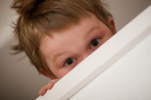 Boy Hiding.