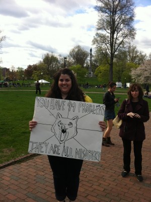 EmFem Rose Parry holding her sign | photo by Tara Jayakar