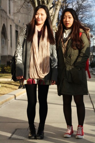 Yujin Choi (COM '14) and Suyeon Lee (CAS '15)  rock kicked-up winter basics accentuated by punches of red, making a fetching pair. Photo by Sharon Weissburg.