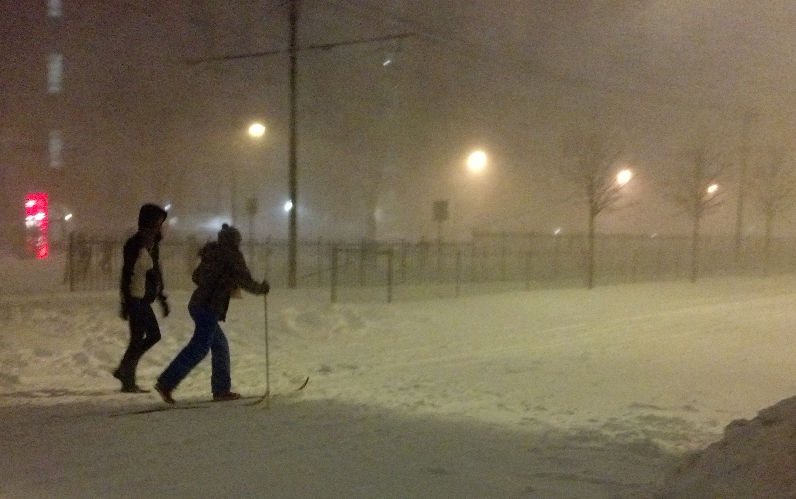 Cross-country skiing down Comm. Ave.