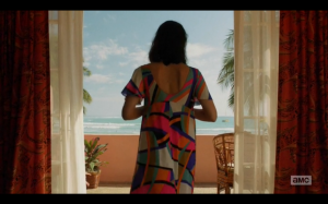 Megan in Hawaii and a Pucci caftan, a powerful woman in her own right. Screenshot by Sharon Weissburg.
