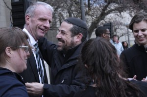 Dean Hill and Rabbi Beyo embraced after speaking at the vigil. | Photo by Jake Lucas