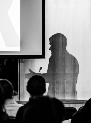 Professor Andrew Bacevich's silhouette as he speaks on US military interventions in the Middle East | Photo by Yu-Ching Chang