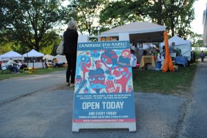 The Cambridge Open Market: Open Today! The Market's official advertisement displayed in Harvard Plaza. Photo by Carol Chin.