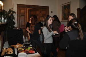 Italian students mingling and enjoying panettone | Photo by Eden Weinberg