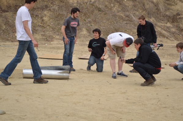 Members of the group examine the aftermath of the rocket's combustion chamber melting off. They look for clues as to exactly what happened while being careful not to move anything from the position it fell in, like crime scene investigators. Photo by Jake Lucas