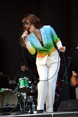 Jenny Lewis, in full rockstar mode, donning a fabulous rainbow suit | Photo by Kara Korab