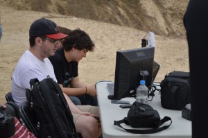 Drew Kelley and Dean DeCarli, the directors of the group's electronics, sit at the ground control table. Photo by Jake Lucas