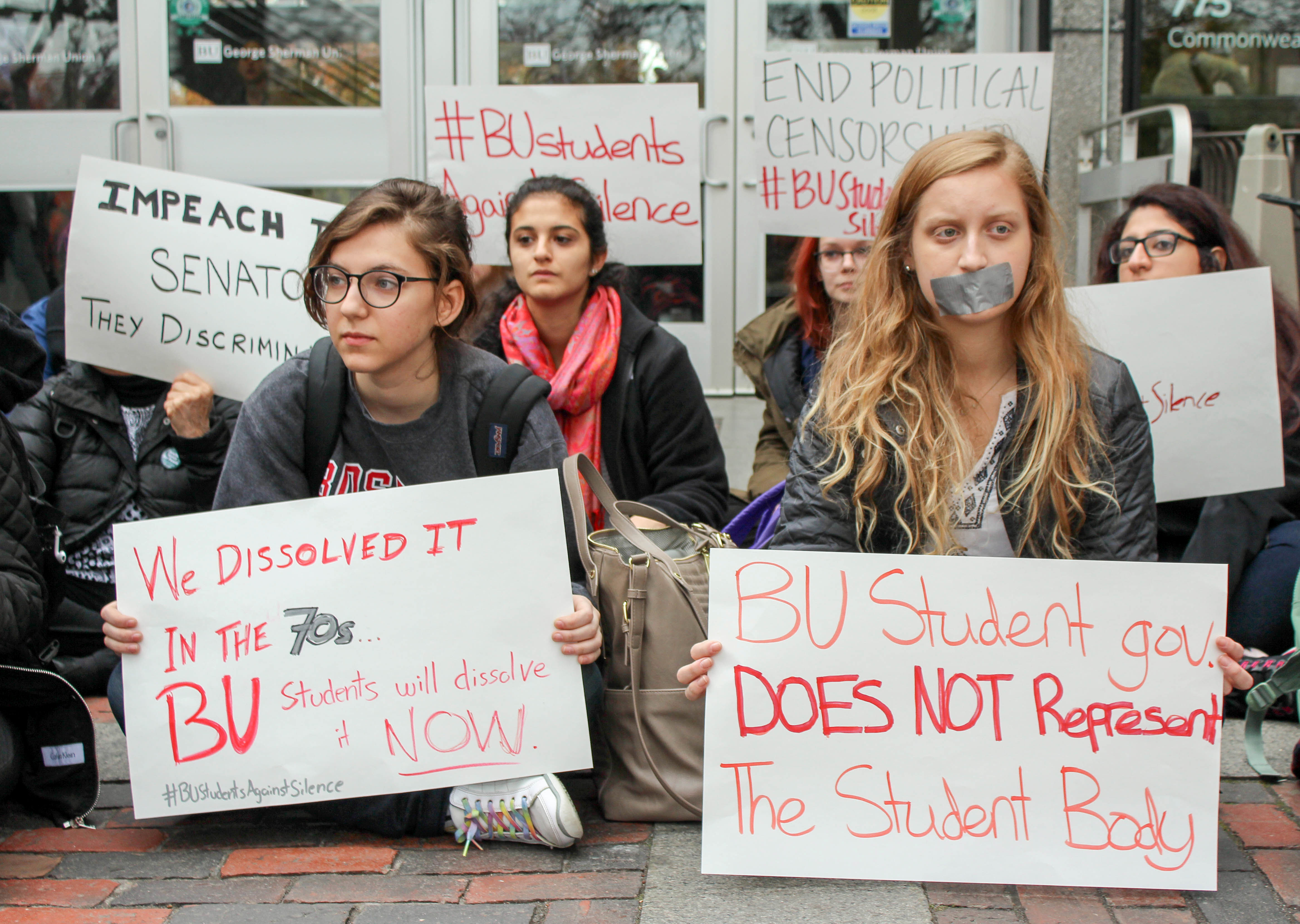 Hanaan Yazdi (CAS '18) and Marlo Kalb (CAS '16) partipate in the protest outside George Sherman Union on Tuesday November 10, 2015. | Photo by Rachel Kashdan