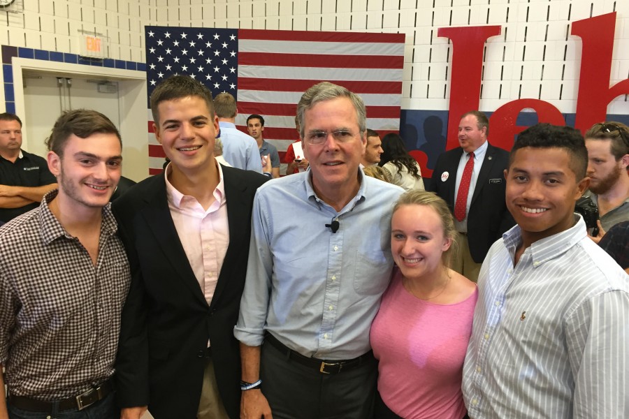 BU College Republicans members Michael Holtz (CAS '18), Corey Pray (CAS '17), Caroline Giovannucci (CAS '18), and Patrick Ayer (SAR '17) with Jeb Bush in Salem, New Hampshire on September 10. | Photo courtesy Corey Pray